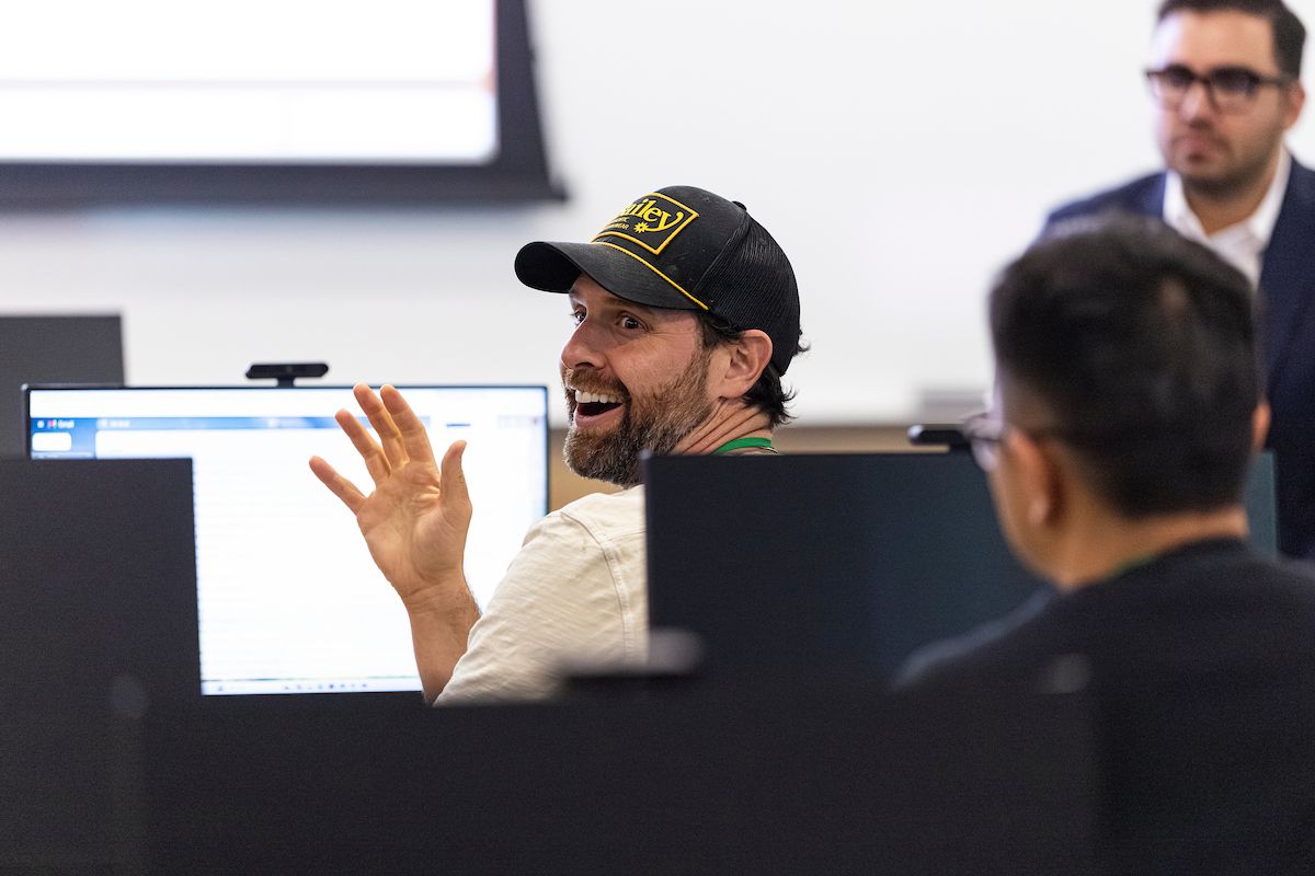 A participant joining a discussion during the workshop